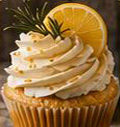 Cupcake garnished with rosemary and lemon